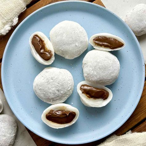 These Nutella Mochi are gooey, delicious, and easy to make with only five ingredients. Learn to make them mess-free in under 45 minutes. Nutella Mochi, Peach Mochi, Mochi Recipes, Fresh Peach Recipes, Butter Mochi, Mochi Recipe, Glutinous Rice Flour, Chocolate Hazelnut Spread, Chocolate Spread