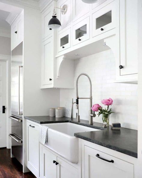 Vintage chic farmhouse in Illinois gets refreshed with charming details Sink Without Window, Black Leathered Granite Countertops, Leathered Granite Countertops, Farm Style Sink, Leathered Granite, White Marble Backsplash, Granite Design, Black Kitchen Countertops, Leather Granite