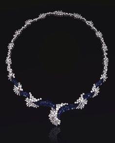 SAPPHIRE AND DIAMOND NECKLACE,  LATE 1960S.  Designed as a series of graduated abstract clusters set with baguette and brilliant-cut diamonds, highlighted at the front by stylised wave motifs close-set with calibré-cut sapphires, mounted in platinum,  signed Schilling.  length approximately 420mm, Sapphire Diamond Necklace, Sapphire And Diamond Earrings, High Jewellery, Necklace Indian, Late 1960s, Jewelry Appraisal, Diamond Necklaces, Shiny Things, Fabulous Jewelry