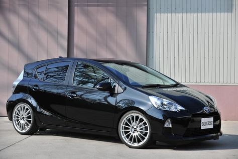 It's amazing what a simple drop and a set of rims can do. Toyota Prius Toyota Aqua Modified, Toyota Prius Custom, Prius Custom, Toyota Aqua, Prius Car, Toyota Hybrid, Do Your Homework, Toyota Prius 2015, Cars Ideas