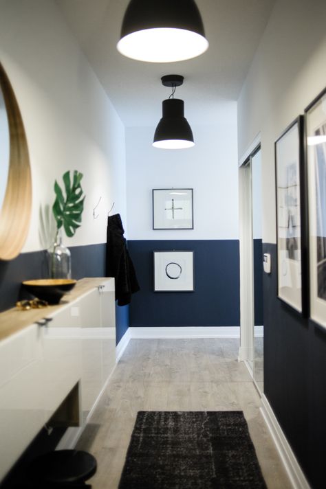 Long condo entryway with navy blue lower half walls Condo Entryway, Small Condo Decorating, Painted Hallway, Blue Hallway, Navy Bedroom, Half Painted Walls, Hallway Paint, Hallway Colours, Small Condo