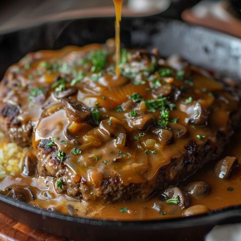 Smothered Hamburger Steak And Gravy, Hamburger Steak With Onion Soup Mix Gravy, Hamburger Steak With Onion Gravy, Brown Gravy Smothered Hamburger Steaks, Hamburger Steak With Onion And Mushroom Gravy, Chopped Steak Recipes, Smothered Steak, Baked Hamburgers, Hamburger Gravy