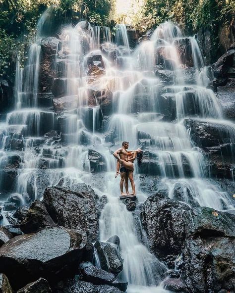 The cliff above is an irrigation channel but the water now gushes endlessly over the cliff. Bali Travel Photography, Bali Waterfalls, Bali Honeymoon, Voyage Bali, Bali Travel Guide, Bali Island, Waterfall Photography, Destination Voyage, Bali Travel