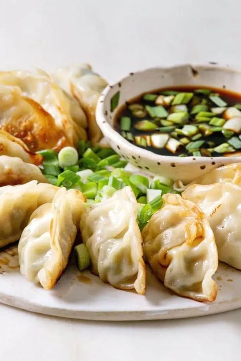 Trader Joe's Potstickers in an Air Fryer - Half-Scratched Potstickers Air Fryer, Frozen Potstickers, Asian Dumplings, Potstickers Recipe, Korean Dumplings, Asian Dinner, Asian Dinners, Onion Sauce, Wontons