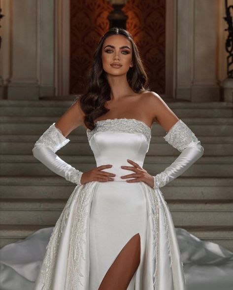 White satin wedding dress embellished with crystals and sequins with detached sleeves. Satin Wedding Dress With Gloves, Wedding Dress Embellished, Wedding Dress With Gloves, White Satin Wedding Dress, White Pageant Dresses, Diamond Wedding Dress, Chic Wedding Gown, Detached Sleeves, Sportswear Outfits