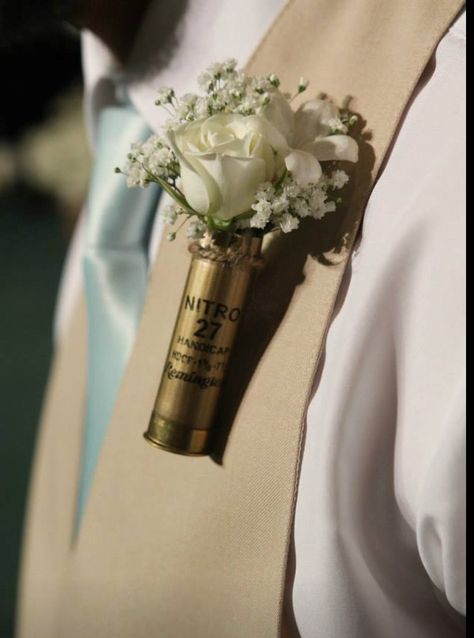 Hit the mark with this shotgun shell boutonnière ! Shotgun shell is filled with million star baby's breath a white spray rose and a bloom of stephanotis- a look any outdoors man wouldn't mind wearing ! Western Style Boutonniere, Country Wedding Boutonniere, Shotgun Shell Boutonniere Diy, Shotgun Wedding Ideas, Boutineer Ideas, White Spray Rose, Flowers At Wedding, Outdoors Man, White Spray Roses