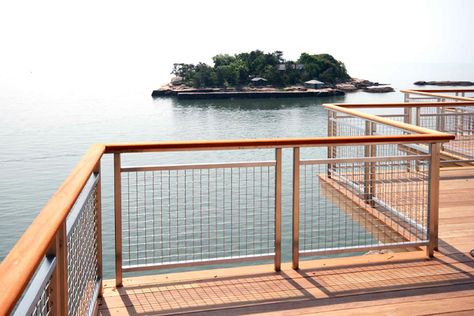 Island Getaway | Banker Wire Railing Spindles, Wire Deck Railing, Rustic Deck, Wood Deck Railing, Metal Deck Railing, Deck Railing Ideas, Deck Railing Design, Metal Deck, Modern Deck