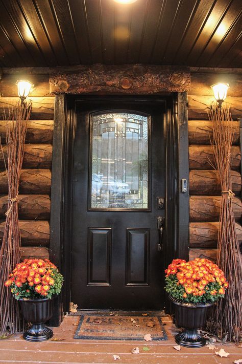 Log Cabin With Black Front Door, Log Cabin Exterior Door Colors, Log Cabin Exterior Doors, Updating A Log Cabin Exterior, Log House Front Door, Log Cabin Door Colors, Log Home Front Door Colors, Log Cabin Doors Entrance Front Entry, Log Home With Black Trim