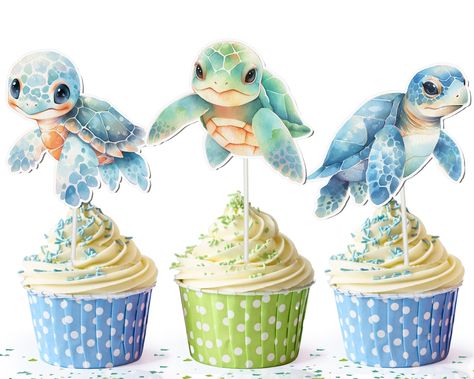 PRICES MAY VARY. Sea Turtle Design: Each topper showcases a high-resolution design featuring adorable sea turtles, creating a delightful underwater atmosphere on your cupcakes. Set of 10: This set includes ten cupcake toppers, allowing you to decorate multiple cupcakes with charming sea turtles or create a cohesive theme for your desserts. Premium Quality: Crafted from food-safe, non-toxic, and eco-friendly materials, these toppers are both safe and suitable for all types of cupcakes and dessert Turtle Birthday Decorations, Sea Turtle Cupcakes, Turtle Cupcakes, Tiffany Baby Showers, Turtle Birthday Parties, Turtle Baby Shower, Turtle Theme, Ocean Adventure, Turtle Birthday