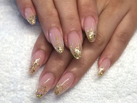 Gold Glitter Swirl Nails, Clear Nails With Gold Glitter, Glitter Gold Tip Nails, Clear Nails Gold Flakes, Gold Tipped Acrylic Nails, Gold Foil Accent Nails, Gold Flake Almond Nails, Coffin Acrylic Nails Gold, White And Gold Sparkle Nails