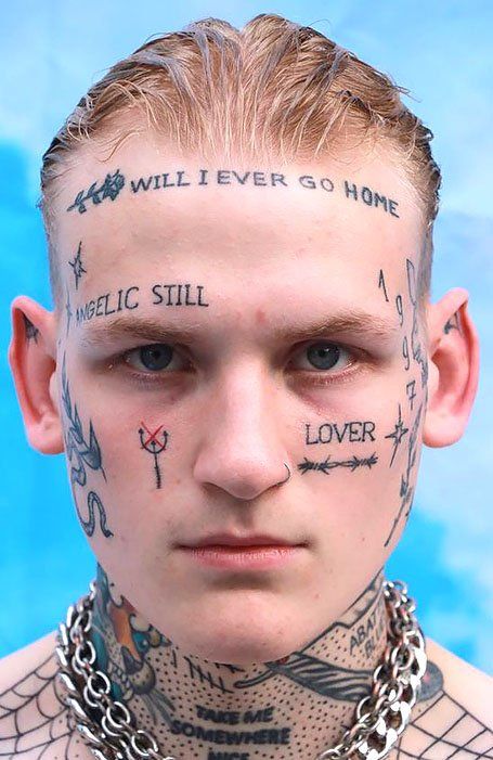 15 Cool Face Tattoos for Ballsy Men in 2021 - The Trend Spotter Cool Face Tattoos, Mens Face Tattoos, Skull Face Tattoo, Small Face Tattoos, Face Tats, Tato Dengan Makna, Men Tattoos, Facial Tattoos, Writing Tattoos