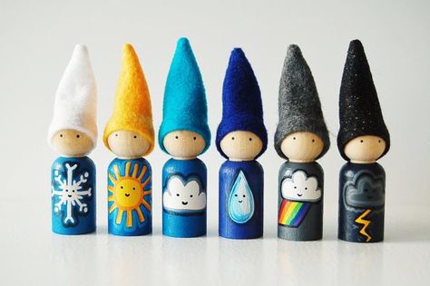 In this handmade Christmas gifts guide find great ideas for imaginative play gifts, educational toys, musical instruments and kids crafts gift ideas. Weather Peg Dolls, Peg Dolls Ideas, Waldorf Peg Dolls, Waldorf Gnomes, Kids Craft Gifts, Wooden Peg Dolls, Weather Theme, Waldorf Crafts, Gnomes Christmas