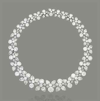 AN IMPORTANT DIAMOND 'HOLLY WREATH' NECKLACE, BY HARRY WINSTON  The graduated collar composed of a continuous series of pear and brilliant-cut diamond trefoil clusters, joined by marquise-cut diamond connections, to a concealed clasp, can detach to form a pair of bracelets, 1960s, 41.6 cm Signed Winston, no. 4984. Estimate  $1,645,022 - $2,741,703  Price Realized   $1,823,286 Harry Winston Necklace, Harry Winston Jewelry, Harry Winston Diamond, Wreath Necklace, Jewelry By Brand, 1960s Jewelry, Holly Wreath, Fantasy Closet, Harry Winston