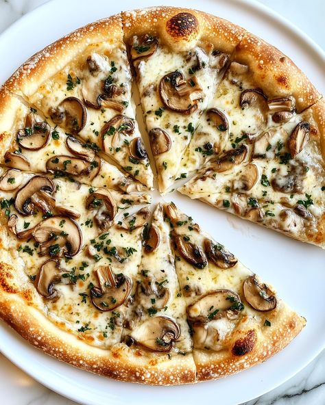 Vegan Mushroom Pizza 🍕🌱 You will definitely want a piz–za this!🤤 Follow @plantiful.palate for more recipes🗒️ Recipe: Ingredients: For the Dough: - 250g plain flour - 150ml warm water - 1 tbsp olive oil - 1 tsp instant yeast - 1/2 tsp salt - 1/2 tsp sugar For the Topping: - 200g mushrooms, thinly sliced - 150g vegan Applewood cheese, sliced - 50g Follow Your Heart vegan Gouda cheese, sliced - 3 tbsp vegan butter - 2 cloves garlic, minced - 1 tbsp fresh parsley, chopped - Salt and pepper, ... Vegetarian Pizzas, Mushroom Pizza Recipes, Pasta Aglio E Olio, Vegetarian Pizza Recipe, Veggie Pizza Recipe, Food Vibes, Special Meals, Sausage Pizza, Mushroom Pizza