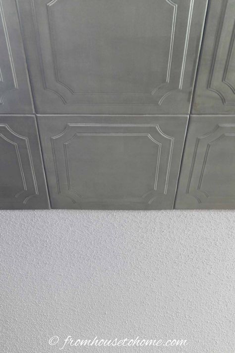 Learn how to install styrofoam faux tin ceiling tiles which add interest to your ceiling and can be used to cover imperfections (or popcorn ceilings). A great way to upgrade your room decor on a budget. #fromhousetohome #roomdecor #ceilings #homedecor Ceiling Repair, Covering Popcorn Ceiling, Removing Popcorn Ceiling, Light Fixture Covers, Faux Tin Ceiling, Guest Bedroom Remodel, Kids Bedroom Remodel, Faux Tin Ceiling Tiles, Small Bedroom Remodel