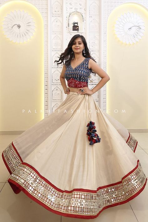 Lavish Offwhite/Blue Designer Navratri Chaniya Choli | PALKHI FASHION Chaniya Choli For Navratri Designer, Chaniya Choli For Navaratri, Blouse Designs For Navratri Choli, Garba Choli Designs, Navratri Designer Outfits, Navratri Dress Mirror Work, Silk Chaniya Choli Designs, Blouse Designs Chaniya Choli, Off White Chaniya Choli