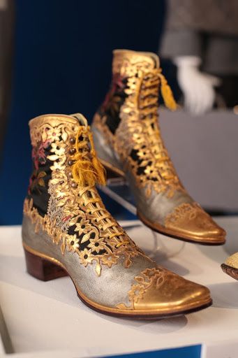 (A/B) Pair of man's silvered leather and black silk brocade ankle boots with gold gilded leather; gilding of floral motif with a daisy-like flower off-set ... Victorian Hats Men, Late 1800s Mens Fashion, Victorian Mens Shoes, Late Victorian Fashion Men, Edwardian Men, 1800s Men, Regency Aesthetic, Edwardian Shoes, Victorian Men