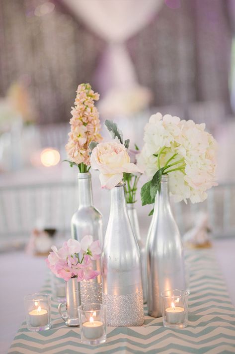 silver wedding centerpiece Fern Centerpiece, Silver Wedding Centerpieces, Table Chevron, Spring Wedding Centerpieces, Cheap Wedding Centerpieces, Wine Bottle Centerpieces, Diy Outdoor Weddings, Wedding Captions, Bottle Centerpieces