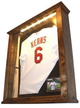 Diy Jersey Display Case, Kids Jersey Display Ideas, Jersey Shadow Box Ideas, Football Jersey Display Ideas, Jersey Display Ideas, Shadow Box Jersey, Sports Shadow Boxes, Sports Jersey Display, Sports Memorabilia Display