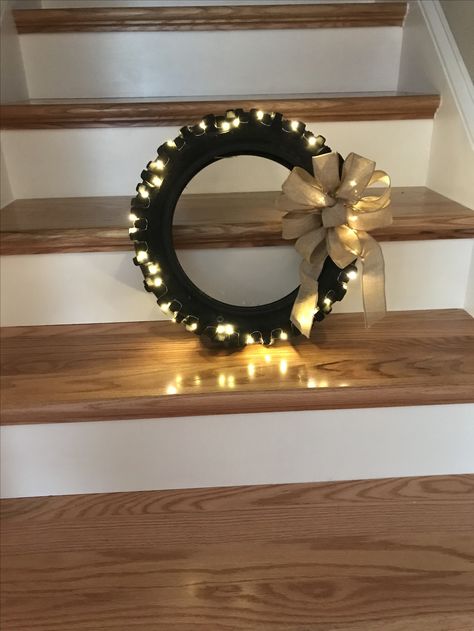 Dirt Bike Tire Wreath, Dirt Bike Tire Ideas, Dirt Bike Decorations, Bike Tire Crafts, Tire Hacks, Motocross Room, Tire Wreath, Dirt Bike Bedroom, Dirt Bike Decor