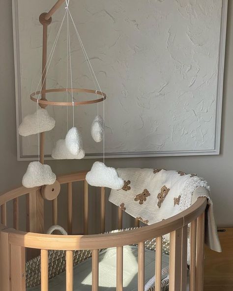 Perfectly styled for a beautiful, neutral nursery ☁️🐻 Order your timeless boucle cloud mobile today via the product link, a staple piece that will grow with your family 🤍 📷 @stixandstems_ * * * #edieandjoe #handmade #babygirlnurseryinspo #smallbusinessowner #scandinursery #bouclemobile #minimalnursery #nurseryideas #neutralnursery #letthembelittle #babykeepsake #genderneutralnursery #cloudthemenursery #handmadebabygift #babygifts #nurserydecor #nurseryinspo #handmadecushions #bouclecloud... Beige Nursery Aesthetic, White And Neutral Nursery, Cloud Nursery Theme Gender Neutral, Baby Room Neutral Colors, Cloud Baby Nursery, Baby Boy Nursery Theme Ideas, Beige Baby Room, Cloud Baby Room, Baby Room Minimalist