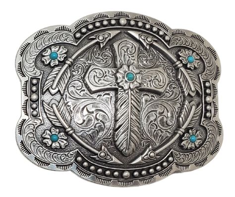 Add a touch of Western charm to your wardrobe with the Feather Cross Belt Buckle. Featuring a beautiful combination of Feathers, Arrows, and 5 Turquoise stones placed just right, this antique silver buckle measures 3 tall by 4 wide and is perfect for Cowboy Church. Whether you visit our retail store in Smyrna, TN or shop online, don't miss the chance to add this unique piece to your collection. Cute Belt Buckles Women, Cross Belt Buckle, Belt Buckles Cowgirl, Ffa Emblem, Cowgirl Belt Buckles, Cross Belt, Western Fits, Cowboy Belt Buckles, Western Stuff