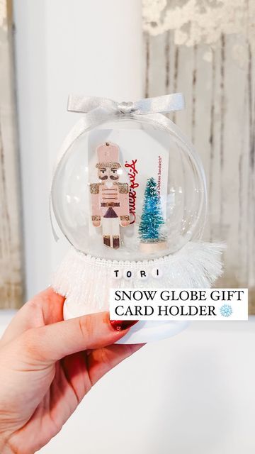 Shelby | Gift-in-a-Box Guide on Instagram: "How to ✨zhuzh up✨ a gift card! Comment HOLDER for everything I used to make them! These snow globe gift card holders turned out soooo cute! I made these for my @orangetheory coaches and was obsessed with how they turned out. Here’s how to make them! #diy #diycrafts #howto #giftcardholder #giftideas #giftidea #diygifts #diygift #lastminutegift #christmasgiftideas #giftwrappingideas #giftwrapping" Diy Snow Globe Gift Card Holder, Snowglobe Gift Card Holder, Snow Globe Gift Ideas, Gift Card Snow Globe Diy, Diy Snowglobe Ornament, Snow Globe Gift Card Holder, Snow Globe Ornaments Diy, Christmas Gift Card Presentation, Prize Board