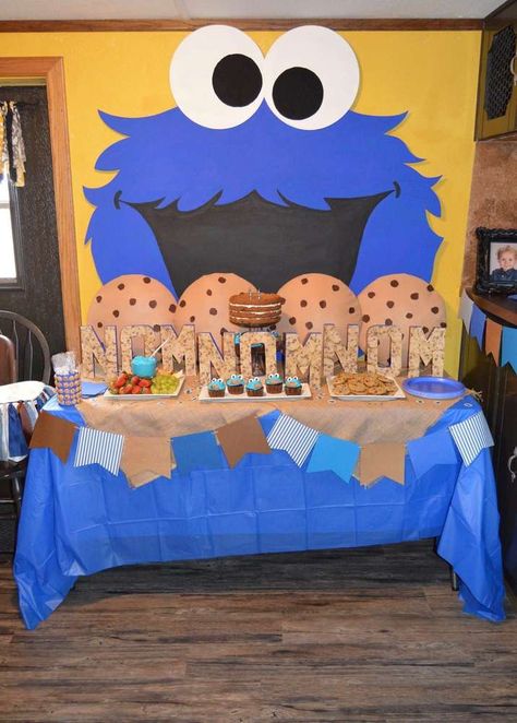 Cookie Monster 2nd Birthday Bash! | CatchMyParty.com Cookie Monster Decorations Diy, Cookie Monster Classroom Door, Cookie Monster Balloon Decorations, Cookie Monster Half Birthday, Cookie Monster Foodie Truck Party, Cookie Monster Birthday Party Decorations, Cookie Monster Decor, Cookie Monster Birthday Decorations, Diy Cookie Monster Decorations