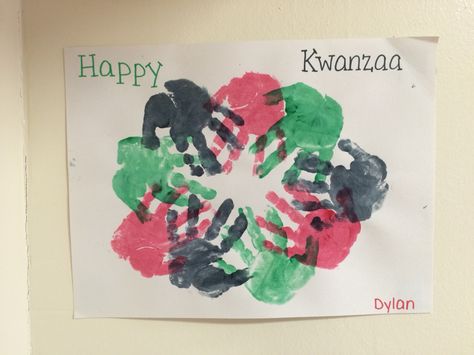 Easy Kwanzaa hand print wreath! Kwanzaa Crafts For Infants, Toddler Kwanzaa Crafts, Kwanzaa Handprint Craft, Kwanza Crafts Toddlers, Kwanza Art For Toddlers, Kwanza Crafts For Toddlers, Kinara Craft Preschool, Holidays Around The World Crafts Preschool, Kwanzaa Art For Toddlers