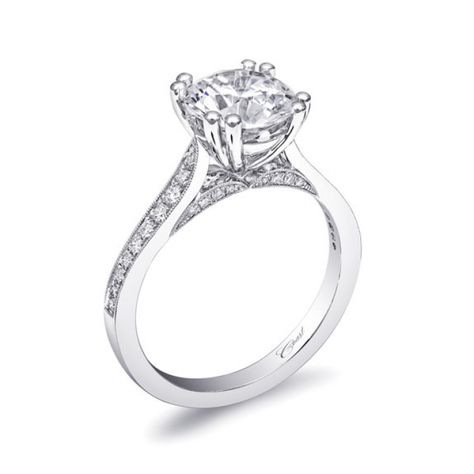 This beautifully refined engagement ring features a 2CT center stone held by double prongs, and fine pave diamonds on the gallery and shoulders of the ring. Delicate milgrain edging adds a vintage touch. Diamond Solitaire Rings For Women, Cheap Diamond Rings, Solitaire Rings, Round Engagement Rings, Diamond Collection, Jewelry Appraisal, Jewels Rings, Round Cut Engagement Rings, Ladies Ring