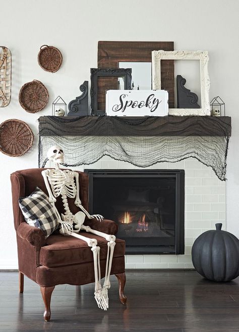 24 Spooky and Stylish Halloween Mantel Decor Ideas Spooky Farmhouse, Farmhouse Halloween Decor, Halloween Mantel Decor, Halloween Mantle Decor, Halloween Fireplace, Mantel Decor Ideas, Halloween Bat Decorations, Minimalist Halloween, Halloween Trends