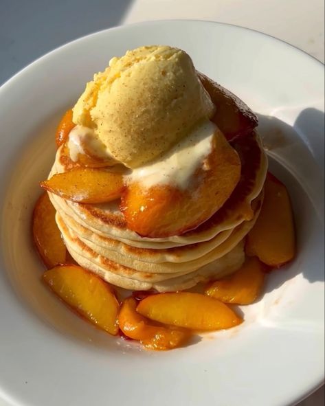 These are something else. Peaches and cream is a dreamy combo and these are SO good - soft, fluffy pancakes stacked with caramelised peaches and ice cream… i am obsessed!! #recipe #food #pancakes #peaches #peach #icecream #pancakeday #pancakerecipeeasy Peaches And Ice Cream, Peach Pancakes, Food Pancakes, Vegan Pancake, Cream Pancakes, Flavored Pancakes, Protein Pancakes Recipes, Pancake Mix Recipes, Peach Syrup