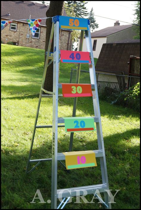 DIY Backyard Ladder Toss Game Ladder Bean Bag Toss, Diy Toss Game, Ladder Toss Game Diy, Homemade Ring Toss Game, Toss Game Diy, Block Party Games, Backyard Games Diy, Ladder Game, Ladder Toss