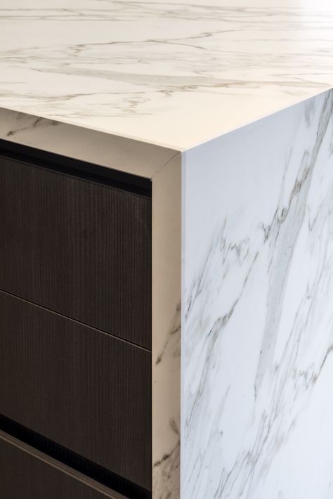 Close up of a Neolith Calacatta island bench with beautiful bookmatching. Installation by @pazstone_  @rachellewisphotography  #cdkstone #neolith #neolithcalacatta #sinteredcompactsurface #extraordinarysurface #scratchresistant #stainresistant #heatresistant #coldresistant #resistanttouvfading #designinspiration #lowmaintenance #greyandwhite #marblelook #slabs #bookmatching Waterfall Marble Countertop, Stone Waterfall Kitchen Island, Waterfall Benchtop, Stone Benchtop Kitchen, Neolith Calacatta, Calacatta Marble Kitchen, Kitchen Platform, Penthouse Kitchen, Marble Kitchen Counters