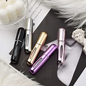 Perfume Travel Refillable Capacity : 5ml-0.2oz/pcs, Each set of 5, Clean in the bottle, easy to check the residue of perfume.Widely used: very suitable for storing perfume, Cologne, aftershave, makeup water, etc. When you are on the road all day, give you a fresh perfume spray. Ultra-light : refillable perfume spray with easy pump fill technology in 5 different colors (silver, pink, gold, purple, black) for carrying or finishing different perfumes. Seed Bead Purse, Perfume Travel, Long Lasting Perfume, Glass Spray Bottle, Cleaning Spray, Perfume Atomizer, Cosmetic Containers, Travel Bottles, Fragrance Spray