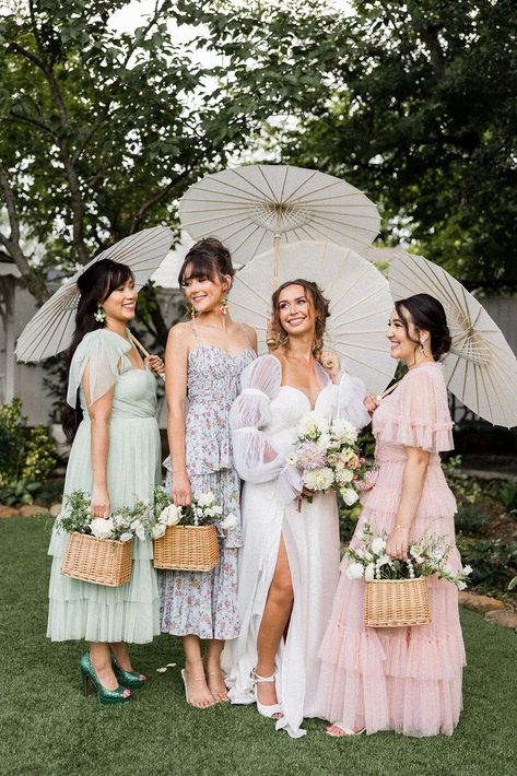 If you are planning a garden wedding and are looking for bridesmaid outfit ideas, save this photo filled with bridesmaid inspiration! From the bridesmaid basket bouquets to the mixed bridesmaid dresses and parasol umbrellas, these bridesmaids were set for this garden wedding in Georgia.Kim Hymes Photography | Atlanta wedding photographer Mix Matched Bridesmaid Dresses, Bridesmaid Basket, Garden Bridesmaids Dresses, Auburn Wedding, Bridesmaid Baskets, Pastel Bridesmaids, Mix Match Bridesmaids, Parasol Wedding, Bright Wedding Colors