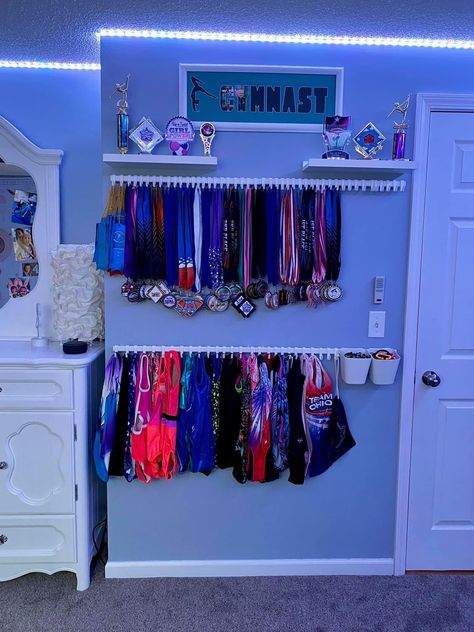 Gymnast Room Ideas, Gymnast Bedroom Ideas, Gymnast Room, Cheer Medal Display, Trophy Organization Ideas, Cheer Gym Decor, Gymnastic Room Ideas, Cheerleading Room, Cheerleading Bedroom Ideas