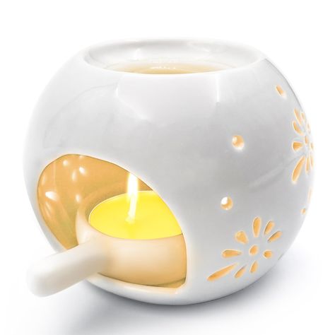 PRICES MAY VARY. Ceramic Tealight Candle Holder Set : 1 pc white ceramic tea light candle holder and 1 pc matching candle spoons, which makes it easy to place in and pull out a tea light candle. Size Information : As the picture shown, cream Ceramic Wax Melt Warmer measures 3.74'' D x 2.91'' H; spoon measures 1.5'' diameter. It is safe and convenient for us to put the tealight candle to the holder. Elegant Decoration : Made of glazed ceramic and was hollowed with a special pattern,the light go t Candle Holder Ceramic, Decoration For Living Room, Balcony Patio, Wax Melt Warmer, Warm Decor, Oil Warmer, Living Room Balcony, Room Balcony, Tea Light Candle Holder