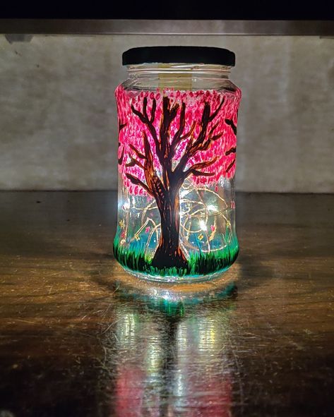 You can try this basically in any type of jar big or small, what I did here is used old jam jar and painted with acrylic paint and gave dark and light shade so that the light passes through the paint and used standard bottle lights to light it up, it's simple, easy and best for a table piece. Please do follow and share @vayllan_de_goa also on Instagram Jam Bottle Decoration, Jam Bottle, Table Piece, Dark And Light, Painting Designs, Jam Jar, Bottle Lights, Acrylic Designs, Small Bottles