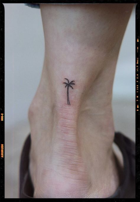 Pics edited by AirBrush App. Filter: Color +ult-3• If you want to get a palm tree tattoo on your wrist, ankle, neck, and more, there is no doubt that a small tattoo is the best choice for you. #airbrush #retouch #photoeditor #filter #airbrushmakeup #airbrushart #airbrushfilter #small #smalltattoo #palm #tree #tattooideas #minimalist Palm Tree Tattoo Black, Minimalist Ankle Tattoo, Minimalist Palm Tree Tattoo, Small Palm Tree Tattoo, Tree Tattoo Black, A Small Tattoo, Small Palm Trees, App Filter, Palm Tree Tattoo