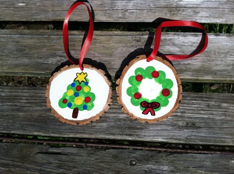 This is an easy fun family activity! Thumb/fingerprint wood slice ornaments. Wood slices can be found for sale at www.etsy.com/shop/lightofdaycreations Wood Slice Fingerprint Ornament, Easy Wood Slice Ornaments For Kids, Wooden Circle Ornaments Diy Kids, Wood Cookie Ornaments For Kids, Wooden Ornaments Diy Wood Slices Kids, Wood Round Ornaments Diy Kids, Wood Slice Ornament Ideas For Kids, Christmas Ornament Wood Slice, Wooden Ornament Ideas For Kids