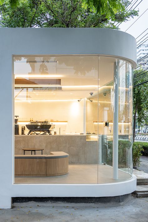 spacy architecture wraps serene bangkok cafe in floating glass Bangkok Cafe, Glass Restaurant, Minimal Form, Shop Facade, Layout Architecture, Roof Structure, Glass Box, Timber House, Glass Facades