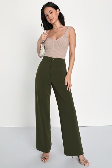 Have all the confidence you need with the Lulus A Power Mood Olive Green High-Waisted Wide Leg Trouser Pants! Lightweight crepe woven fabric shapes a boss-babe, high banded waist with a hidden zip fly and a covered button closure. Wide pant legs fall to ankle-grazing hems and feature decorative welt pockets at the back. Fit: This garment fits true to size. Length: Floor length. Size medium Inseam: 30.75 Front Rise: 12.00 Waist: Fitted - very fitted at natural waist. Hip: Fitted - consider sizing Gold And White Outfit, Green Trousers Outfit, Olive Green Pants Outfit, Olive Green Outfit, Wide Leg Trousers Outfit, Best Work Pants, Green Pants Outfit, Dark Green Pants, Olive Clothing