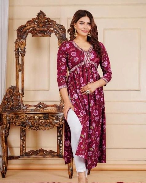 PRICE- ₹579/-FREE SHIP/ CASH ON DELIVERY ✅ Catalog Name: *Aliya Cut Kurti Wine With Embroidery* Aliya Cut Kurta beautiful Aliya Cut kurti with Embroidery which is made from Rayon fabric with beautiful print all over.This kurta has been designed keeping in mind the latest trends in contemporary casual fashion. The dress combines ethnic with the fashion of today and makes you stand out among others when you adorn it. #instagram #kurties #amazingfashion #outfitoftheday #trendyfashion #aliya... Aaliyah Cut Kurti Design, Aliya Cut Dress Design, Alia Cut Kurti Pattern, Alia Cut, Onam Outfits, Kurti Patterns, Kurti Designs Latest, Fashion Vocabulary, Rayon Fabric