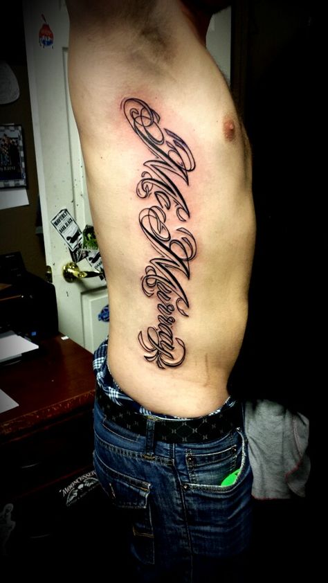 Last name rib piece tattoo Names On Ribs Tattoo, Rib Tattoos Men, Tattoo Names, Ribs Tattoo, Rib Tattoos For Guys, Piece Tattoo, Omerta Tattoo, Tattoos Men, Forearm Sleeve