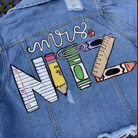 Teacher Blue Jean Jacket, Teacher Denim Jacket Painted, Silly Outfit Day At School For Teachers, Hand Painted Teacher Shoes, School Staff Picture Day Outfit, Teacher Painted Jean Jacket, Teacher Jacket Ideas, Painted Teacher Jacket, Teacher Denim Jacket