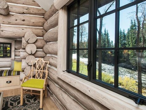 White Log Cabin Exterior, Bedroom With Sloped Ceiling, Log Cabin Walls, Black And Cream Rug, Living Room Window Seat, Yellow And Gray Wallpaper, Log Cabin Bedrooms, Log Cabin Remodel, Cabin Walls