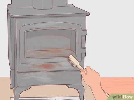 How to Clean a Cast Iron Stove: 10 Steps (with Pictures) - wikiHow Cleaning Rusty Cast Iron, Cast Iron Pot Belly Stove, Restore Cast Iron, Iron Cleaner, Stove Black, Diy Wood Stove, Cast Iron Burner, Wood Burning Oven, Cast Iron Cleaning