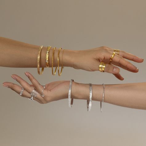 Add a touch of elegance to every occasion with our stunning gold and silver bangles! ✨️ Stack them up for a bold statement or wear them solo for a subtle touch of glamour.  . #jewellerysydney #BangleBeauty #GlamStack #ShineOn #BangleBliss #ChicArmCandy #Silverjewellery #GoldenGleam #goldjewellery #EverydayElegance #jewellerybiz #perfectstack Jewelry Content Ideas, Moodboard Jewelry, Classic Jewelry Pieces, Jewelry Product Shots, Jewelry Store Design, Creative Jewelry Photography, Jewelry Photography Styling, Instagram Jewelry, Jewelry Photoshoot