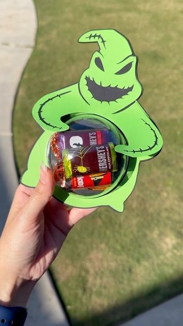 Oogie Boogie Party Decor, Oogie Boogie Pinata, Oogie Boogie Drawing Easy, Oogie Boogie Birthday Party, Jack Skellington Party Ideas, Nightmare Before Christmas Birthday Idea, Boogie Baby, Plastic Christmas Ornaments, Halloween First Birthday